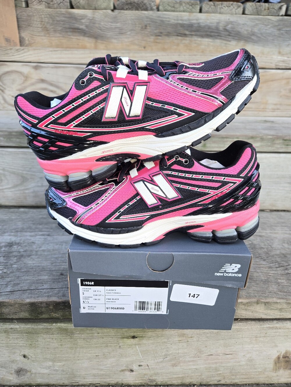Brand new!! New in the box, New Balance 1906R pink/black athletic shoes sz 6.5W